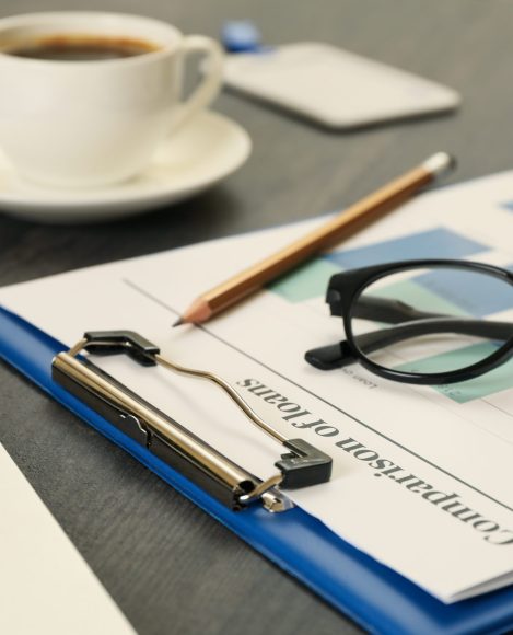 Concept of finance planning on black wooden table